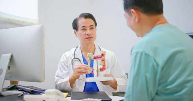 Doctor reviewing records with patient in Louisville, KY